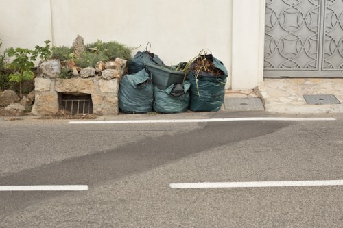 Waste removal truck operating in Glen Huntly